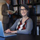 woman at laptop in library